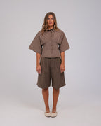Annika Shorts, Ash Brown