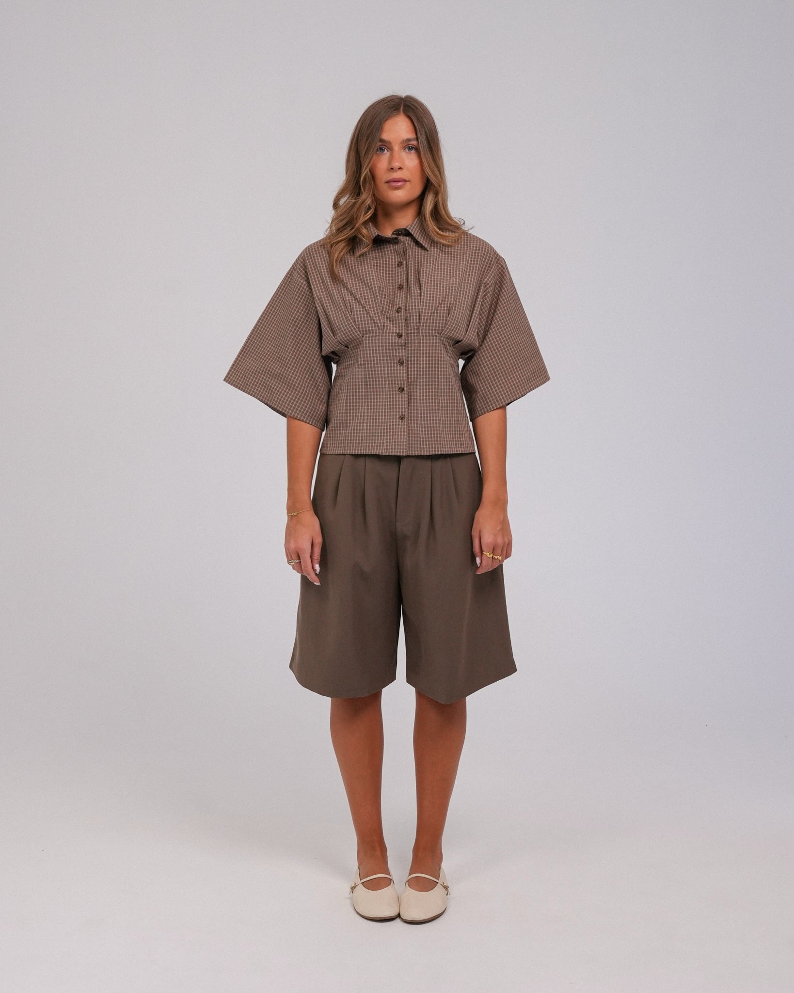Annika Shorts, Ash Brown