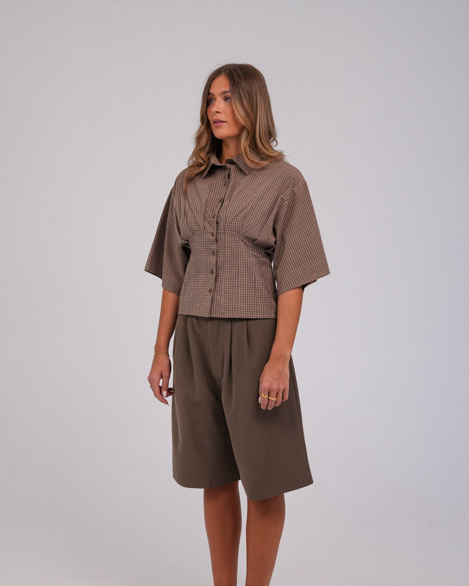 Annika Shorts, Ash Brown