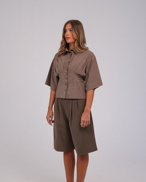 Annika Shorts, Ash Brown