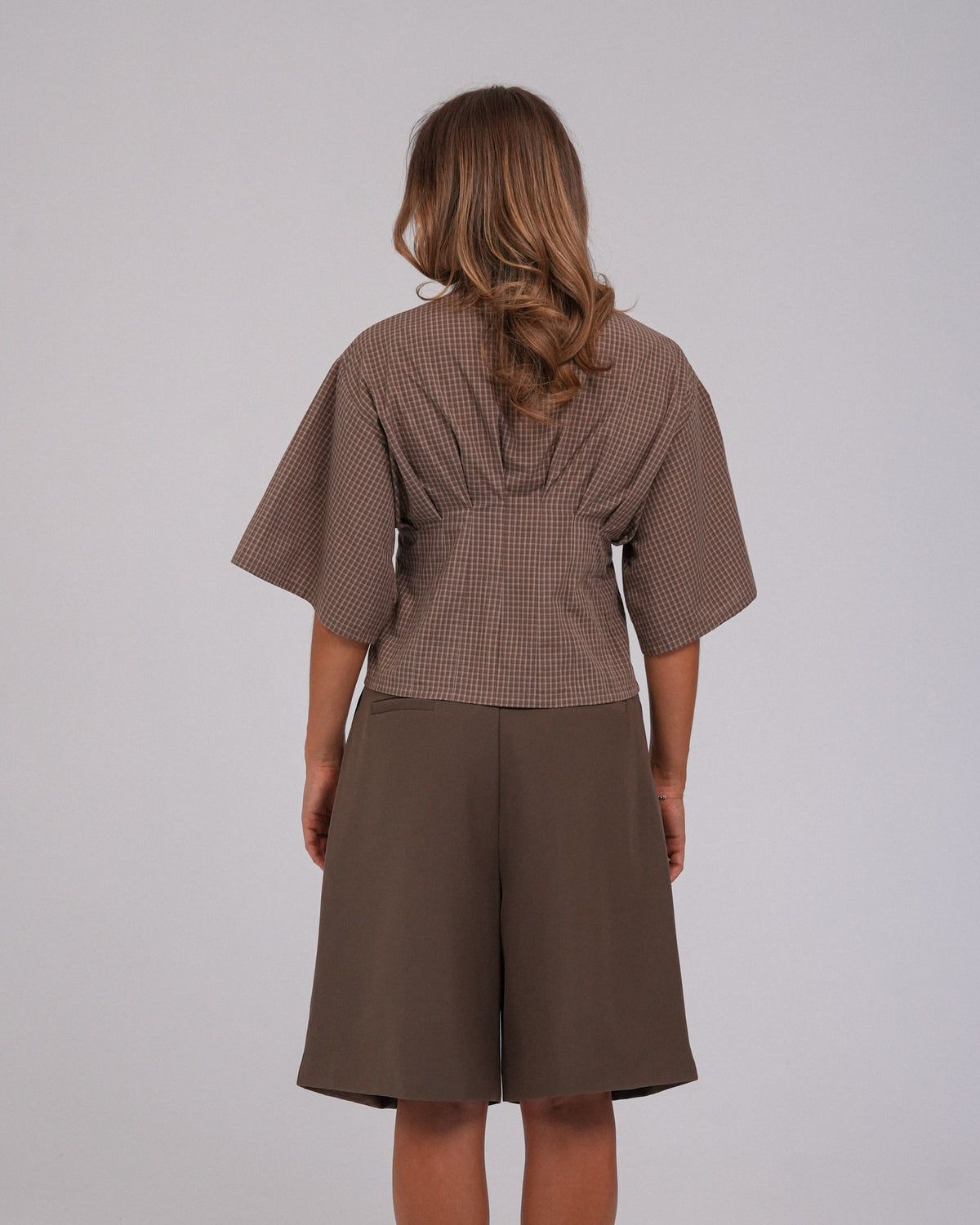 Annika Shorts, Ash Brown