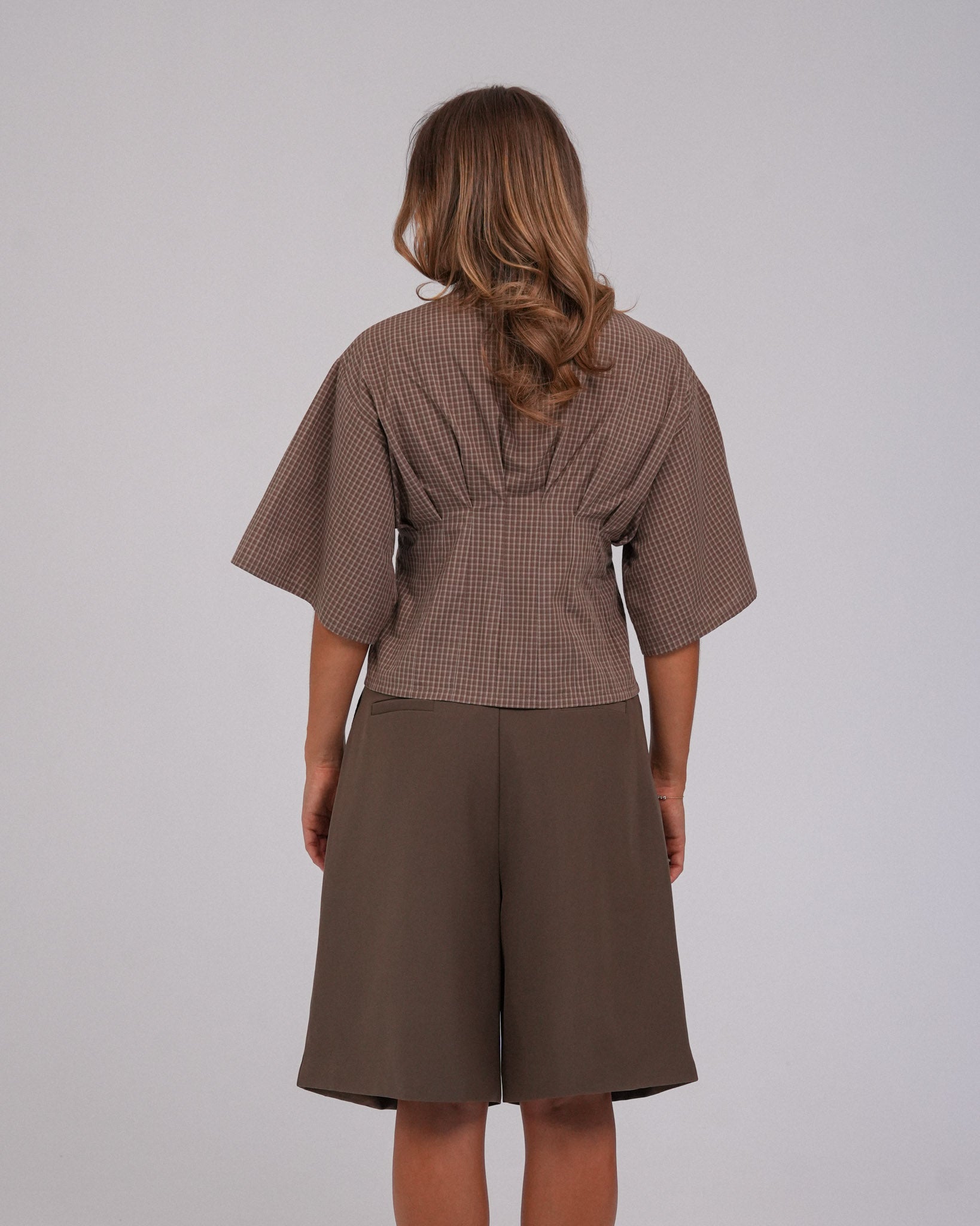 Annika Shorts, Ash Brown